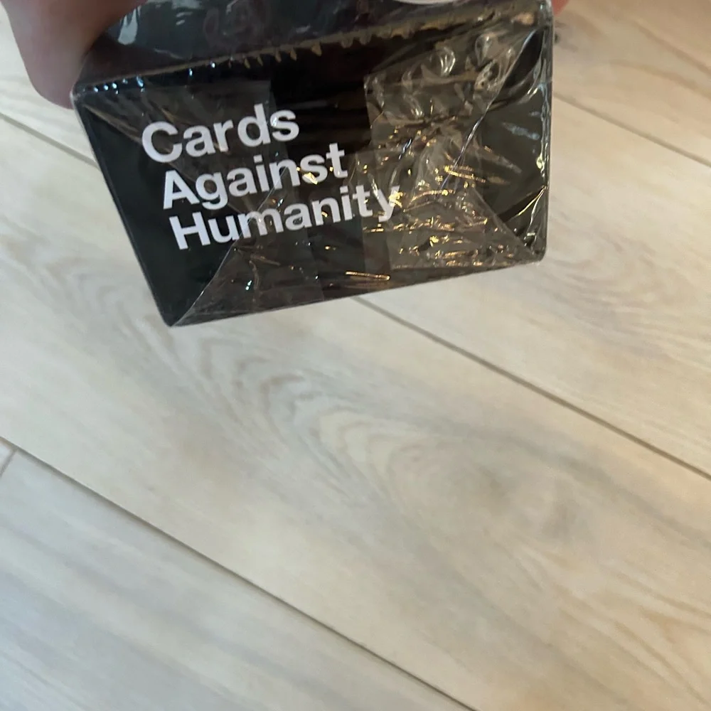 CARDS AGAINST HUMANITY, never opened! - Picture 7 of 9